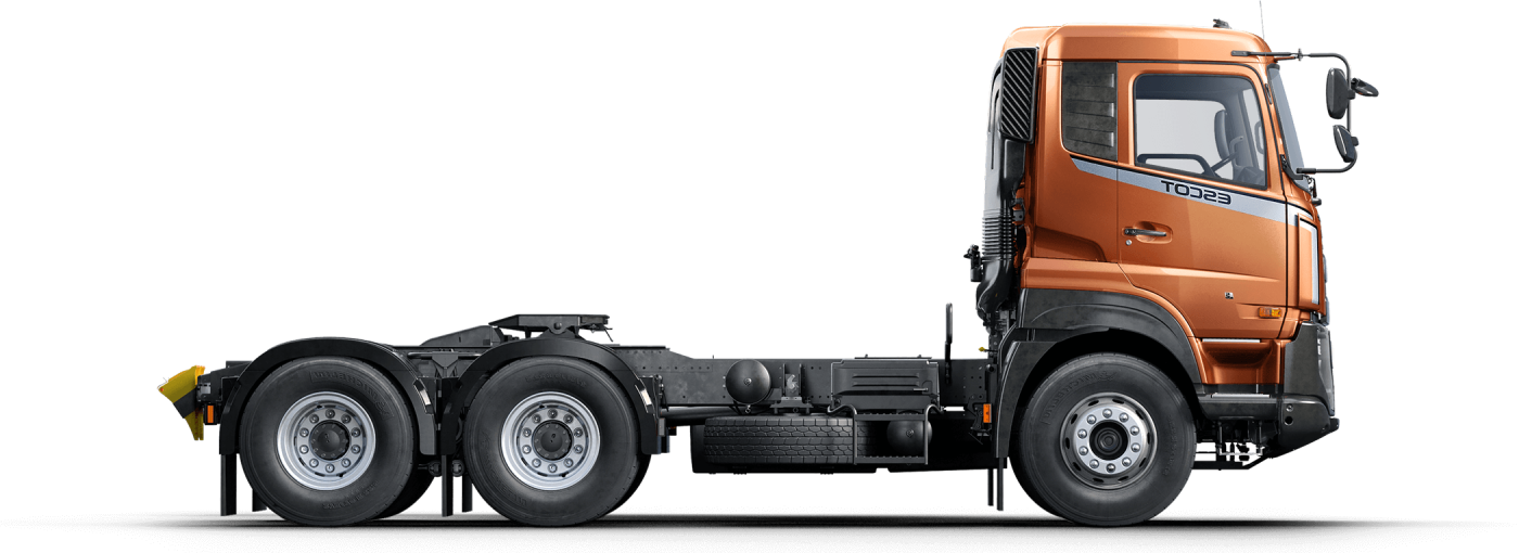 Xe đầu kéo màu cam, không có thùng sau, nhìn từ bên hông.