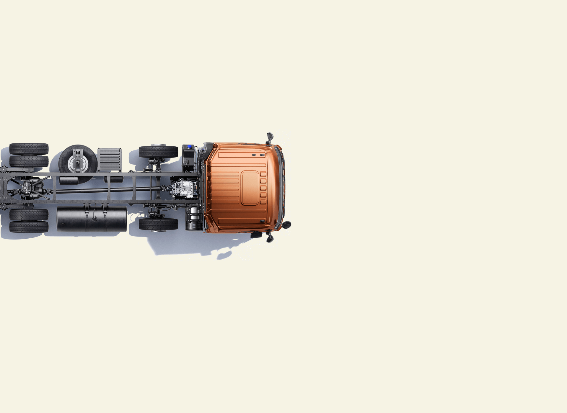 រថយន្តធំមួយពណ៌ទឹកក្រូចម្ខាងខាងឆ្វេងលើផ្ទៃពណ៌ស